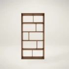 Tall walnut bookcase with asymmetrical open shelving in a modern grid layout