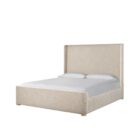 Upholstered bed with a high winged headboard in textured neutral fabric, rounded corners, and low wood feet, shown in both studio and lifestyle settings.