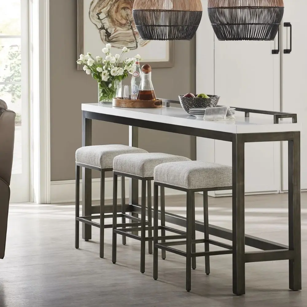 Contemporary console table with white top, gunmetal frame, and three matching upholstered stools.