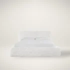 The Highland Bed in soft white upholstery