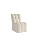 A modern armless side chair in soft ivory bouclé with deep vertical channelling on the seat and back, featuring a fully upholstered silhouette.