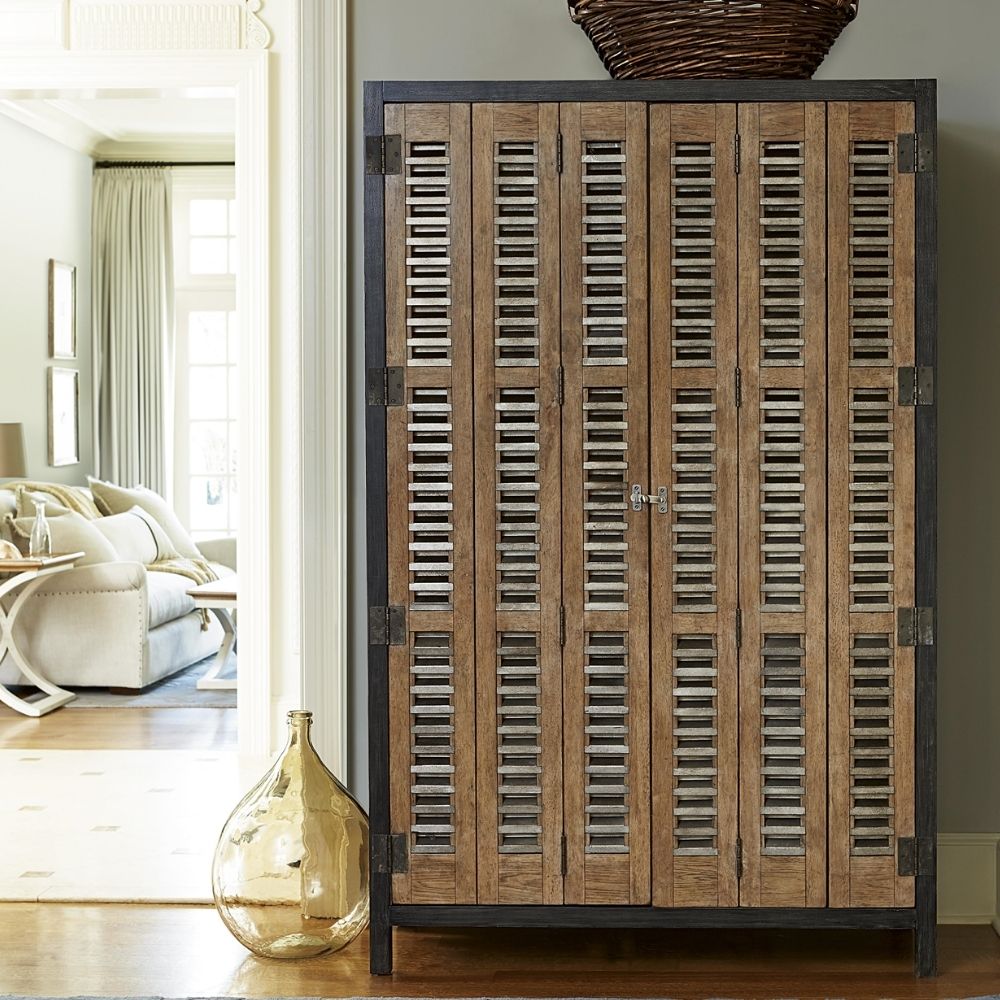 Wooden locker-style cabinet with louvered doors, black metal framing, and industrial hardware details.