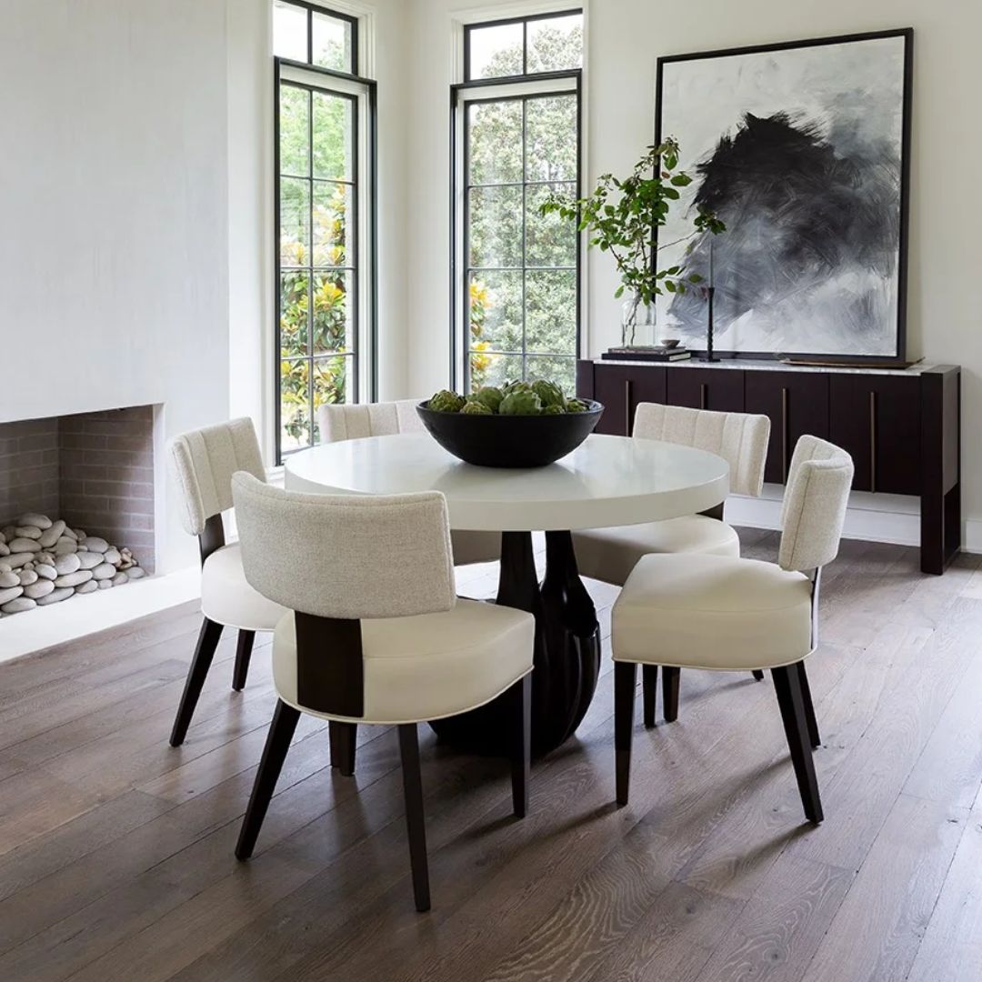 Loleta Side Chair with cream seat upholstery, channeled backrest, and tapered dark wood legs.