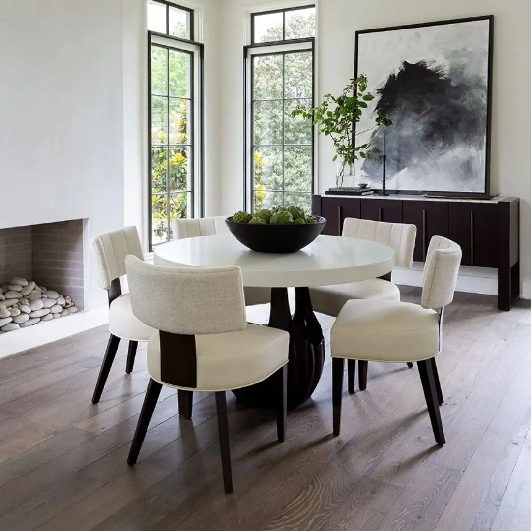 Loleta Side Chair with cream seat upholstery, channeled backrest, and tapered dark wood legs.