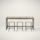 Industrial-style console table with a natural wood top, black metal frame, and three upholstered stools in ivory fabric.