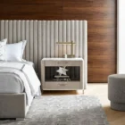 The Soren Bedside Table with marble top and wood body featuring two drawers and open shelf.