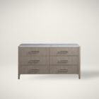 Soren Dresser featuring six drawers, marble top, and metal handles.