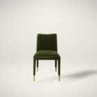Conifer Dining Chair in rich green velvet with brass leg caps.