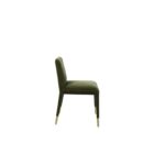 Conifer Dining Chair in rich green velvet with brass leg caps.