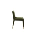 Conifer Dining Chair in rich green velvet with brass leg caps.