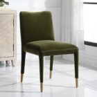 Conifer Dining Chair in rich green velvet with brass leg caps.