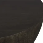 Round black coffee table with a smooth, matte finish and softly curved base in a minimalist drum silhouette
