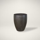 Dark-stained, barrel-shaped wood end table with a smooth, rounded silhouette.