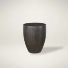 Dark-stained, barrel-shaped wood end table with a smooth, rounded silhouette.