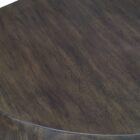 Dark-stained, barrel-shaped wood end table with a smooth, rounded silhouette.