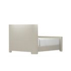 The Tilburg Bed featuring a high, fully upholstered headboard and footboard in a soft neutral fabric with a clean, curved silhouette.