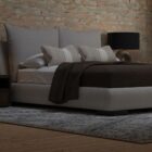 Upholstered Bed with Double-Cushion Headboard and Rounded Base, Dressed in Neutral Bedding.