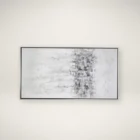 Abstract wall art featuring a softly blended palette of whites, greys, and subtle metallics, framed in a slim black frame.