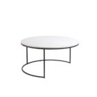 Set of two round nesting coffee tables with white marble tops and thin black metal bases, shown partially stacked.