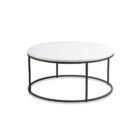 Set of two round nesting coffee tables with white marble tops and thin black metal bases, shown partially stacked.