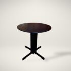 Sleek black round pub-height table with slatted top and sturdy X-base, shown against a neutral background.