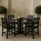 Sleek black round pub-height table with slatted top and sturdy X-base, shown against a neutral background.