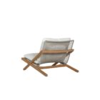 Outdoor lounge chair with angled wood frame and plush white cushions.