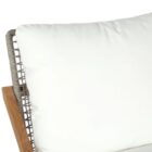 Outdoor lounge chair with angled wood frame and plush white cushions.