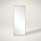 A modern full-length rectangular mirror with a slim metallic frame and a minimalist design.