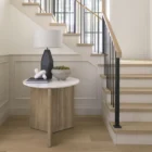 Mercana Enzo end table with a white marble top and fluted wood base in a natural finish.