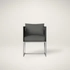 Modern outdoor dining chair with charcoal cushions, black woven frame, and sleek stainless steel base.