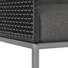 Modern outdoor dining chair with charcoal cushions, black woven frame, and sleek stainless steel base.