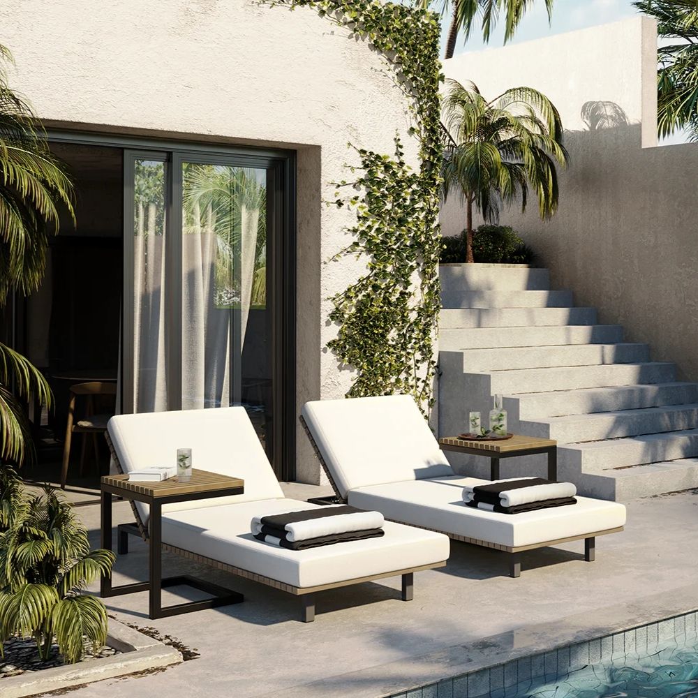 A contemporary modular sectional sofa in light beige fabric with three seats, a chaise lounge, and a built-in walnut wood and black storage table.
