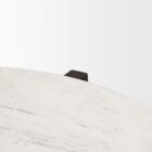Round marble-top coffee table with cross-shaped dark wood base.
