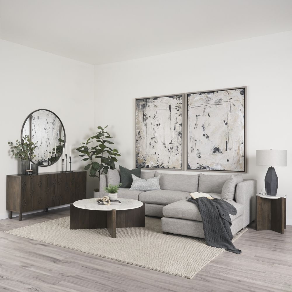 Round marble-top coffee table with cross-shaped dark wood base.