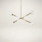 Modern chandelier with six hammered glass globe bulbs and a brushed brass angular frame.