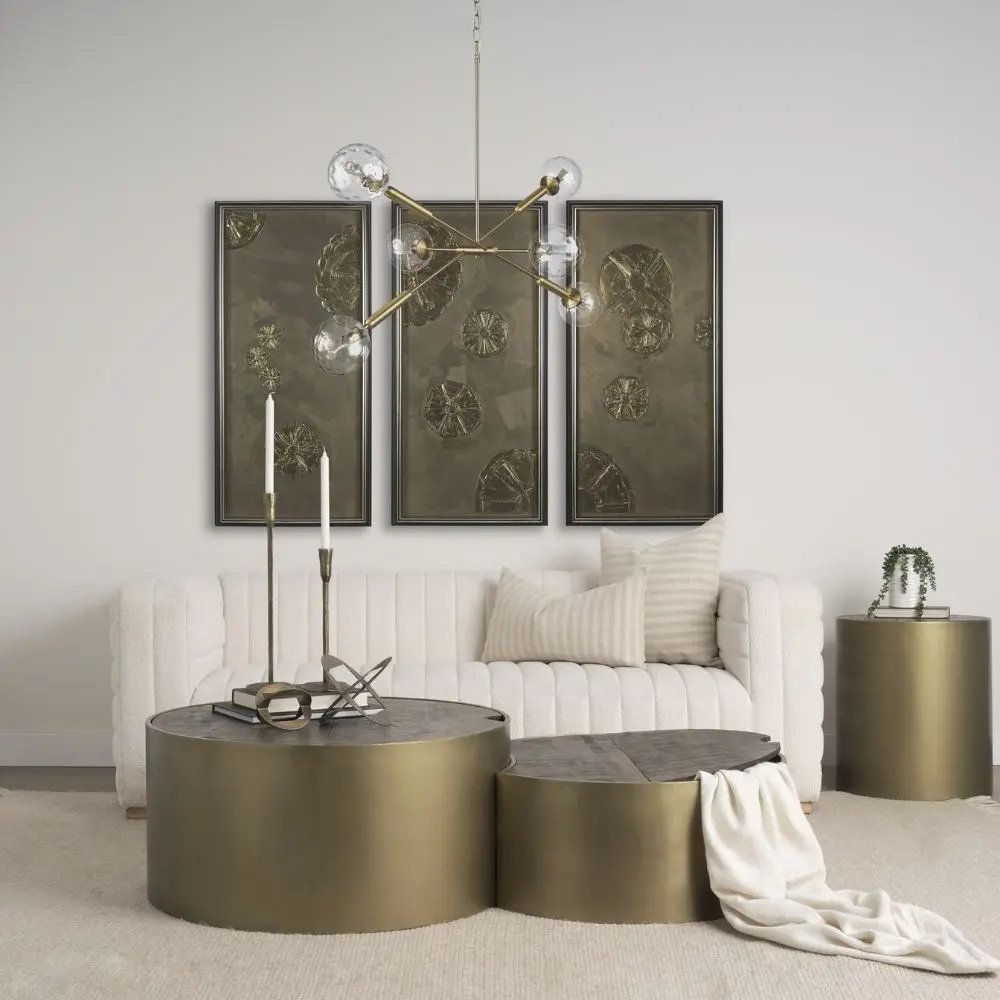 Modern chandelier with six hammered glass globe bulbs and a brushed brass angular frame.