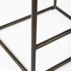 Minimalist counter-height stool with dark woven leather seat and slender black metal frame.