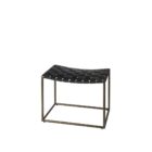 Modern ottoman with black woven leather seat and brass-finished metal frame.