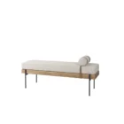Mercana Colburne bench with beige cushion, natural wood base, and black metal legs, featuring a strapped bolster pillow.