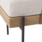 Mercana Colburne bench with beige cushion, natural wood base, and black metal legs, featuring a strapped bolster pillow.