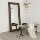 Rustic full-length mirror with thick reclaimed wood frame in a dark natural finish.