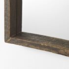 Rustic vertical wall mirror with thick reclaimed wood frame and natural imperfections.