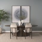Dark wood oval dining table with sculpted fluted pedestal base.