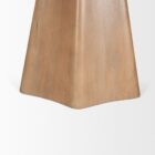 Round natural wood dining table with sculptural pedestal base.
