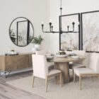 Round wall mirror with slim metal frame.