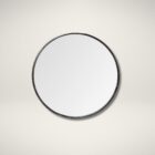 Round wall mirror with slim metal frame.