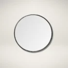 Round wall mirror with slim metal frame.