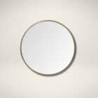 Round wall mirror with slim metal frame.
