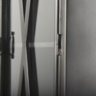 Tall black metal cabinet with double glass doors and X-brace detailing.